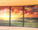 Storefront signs are a great way to both promote your business and to make great use of clear, empty window ad space.